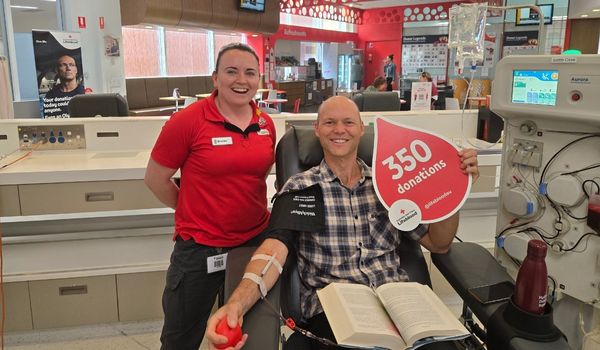 Wes pictured making his 350th donation with a Lifeblood Nurse