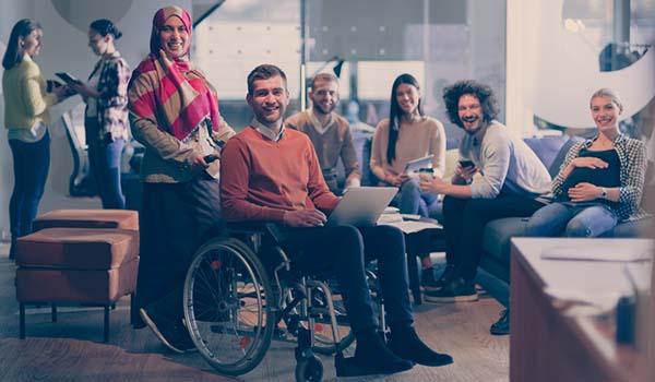 group of workers supporting people with disability